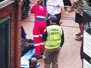 assisting collapsed lady at BiscuitMill 2